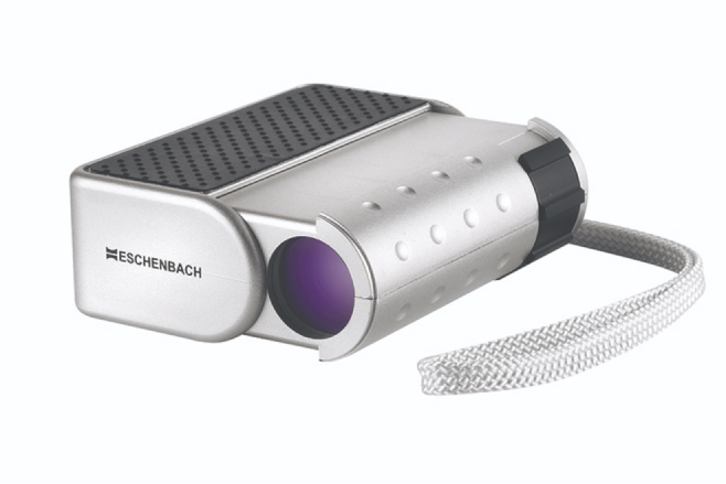 Portable Eschenbach low vision aid with a built-in magnifier and wrist strap, designed to assist individuals with visual impairments.